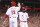 CINCINNATI, OH - JULY 15: Brandon Phillips #4 and Joey Votto #19 of the Cincinnati Reds celebrate after both scored runs in the eighth inning after a single by Scott Rolen (not pictured) during the game against the St. Louis Cardinals at Great American Ball Park on July 15, 2012 in Cincinnati, Ohio. The Reds won 4-2. (Photo by Joe Robbins/Getty Images)