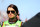 DAYTONA BEACH, FL - FEBRUARY 21:  Danica Patrick, driver of the #10 GoDaddy.com Chevrolet, stands on the grid prior to the NASCAR Sprint Cup Series Budweiser Duel 1 at Daytona International Speedway on February 21, 2013 in Daytona Beach, Florida.  (Photo by Mike Ehrmann/Getty Images)
