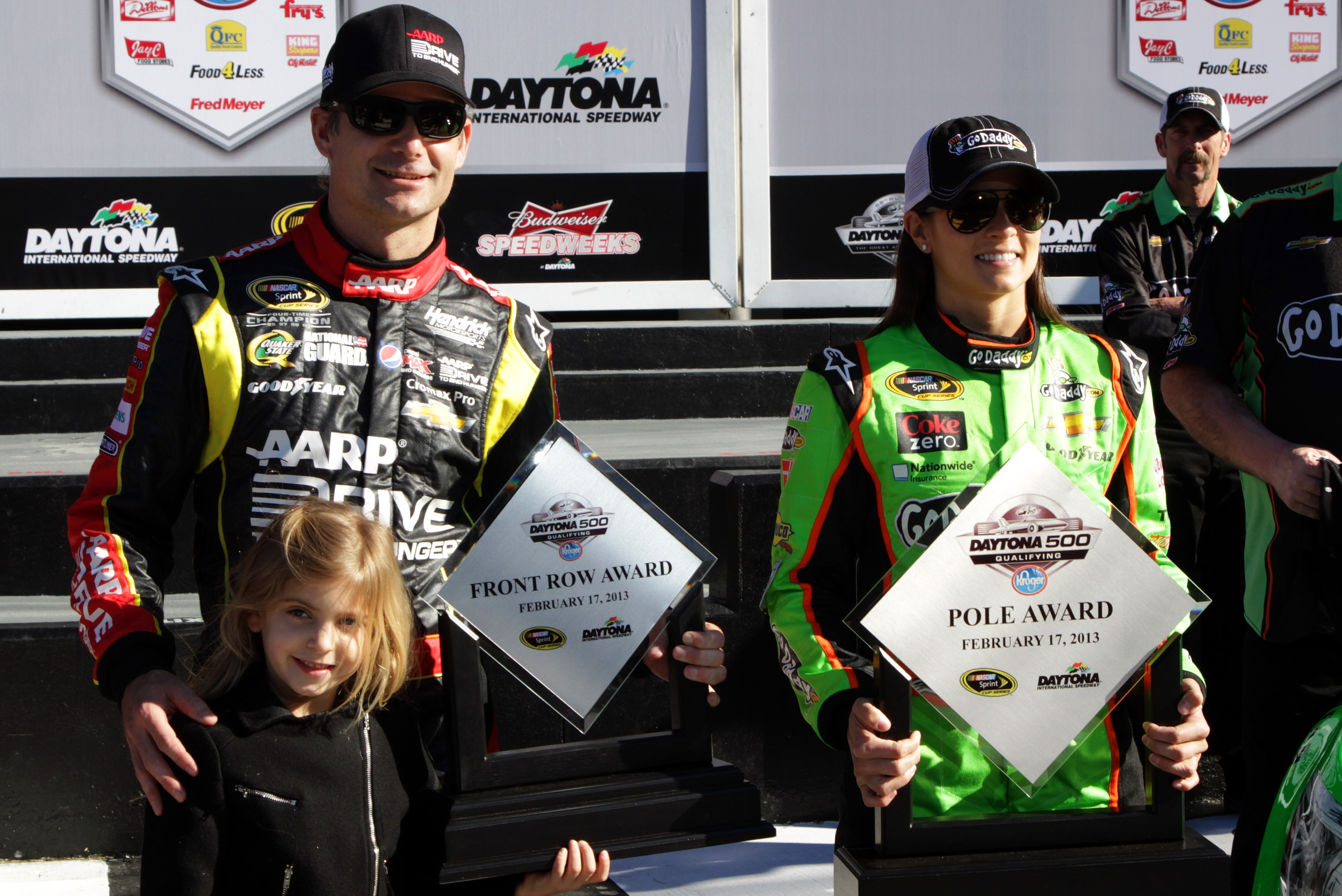 DAYTONA BEACH, FL - FEBRUARY 17: Danica Patrick, driver of the #10 GoDaddy.com Chevrolet, with her Pole Award and Jeff Gordon, driver of the #24 Drive To End Hunger Chevrolet, with his Front Row Award after qualifying for the NASCAR Sprint Cup Series Daytona 500 at Daytona International Speedway on February 17, 2013 in Daytona Beach, Florida. (Photo by Jerry Markland/Getty Images)