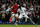 LONDON, ENGLAND - MARCH 03:  Emmanuel Abebayor of Spurs is challenged by Mikel Arteta of Arsenal during the Barclays Premier League match between Tottenham Hotspur and Arsenal FC at White Hart Lane on March 3, 2013 in London, England.  (Photo by Paul Gilham/Getty Images)