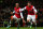 LONDON, ENGLAND - DECEMBER 29: Theo Walcott of Arsenal celebrates scoring his hat trick and Arsenal's seventh goal with Olivier Giroud of Arsenal during the Barclays Premier League match between Arsenal and Newcastle United at the Emirates Stadium on December 29, 2012 in London, England.  (Photo by Clive Mason/Getty Images)