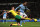 NORWICH, ENGLAND - DECEMBER 29:  Michael Turner of Norwich City and Joleon Lescott of Manchester City tussle for the ball during the Barclays Premier League match between Norwich City and Manchester City at Carrow Road on December 29, 2012 in Norwich, England.  (Photo by Jamie McDonald/Getty Images)