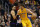 Jan. 30, 2013; Phoenix, AZ, USA: Los Angeles Lakers forward Pau Gasol (16) controls the ball against Phoenix Suns forward Luis Scola at the US Airways Center. Mandatory Credit: Mark J. Rebilas-USA TODAY Sports