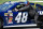 A team member pushes the No. 48 Chevrolet on pit road in Daytona before a practice run.  Credit: Dwight Drumo