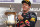 SAKHIR, BAHRAIN - APRIL 21:  Sebastian Vettel of Germany and Infiniti Red Bull Racing celebrates on the podium after winning the Bahrain Formula One Grand Prix at the Bahrain International Circuit on April 21, 2013 in Sakhir, Bahrain.  (Photo by Mark Thompson/Getty Images)