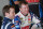 Kasey Kahne and Dale Earnhardt Jr. smile with crew members in the Daytona garage.  Credit: Dwight Drum