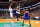 BOSTON, MA - APRIL 26: Raymond Felton #2 of the New York Knicks passes the ball underneath the basket to teammate Tyson Chandler #6 of the New York Knicks in front of Brandon Bass #30 of the Boston Celtics during Game Three of the Eastern Conference Quarterfinals of the 2013 NBA Playoffs on April 26, 2013 at TD Garden in Boston, Massachusetts. NOTE TO USER: User expressly acknowledges and agrees that, by downloading and or using this photograph, User is consenting to the terms and conditions of the Getty Images License Agreement. (Photo by Jared Wickerham/Getty Images)
