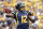 PITTSBURGH, PA - SEPTEMBER 01:  Geno Smith #12 of the West Virginia Mountaineers drops back to pass against the Marshall Thundering Herd during the game on September 1, 2012 at Mountaineer Field in Morgantown, West Virginia.  (Photo by Justin K. Aller/Getty Images)