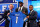 NEW YORK, NY - APRIL 25:  Ezekiel Ansah of the BYU Cougars stands with NFL Commissioner Roger Goodell (L) and Pro Football Hall of Famer Barry Sanders (R) as they hold up a jersey on stage after Ansah was picked #5 overall by the Detroit Lions in the first round of the 2013 NFL Draft at Radio City Music Hall on April 25, 2013 in New York City.  (Photo by Al Bello/Getty Images)