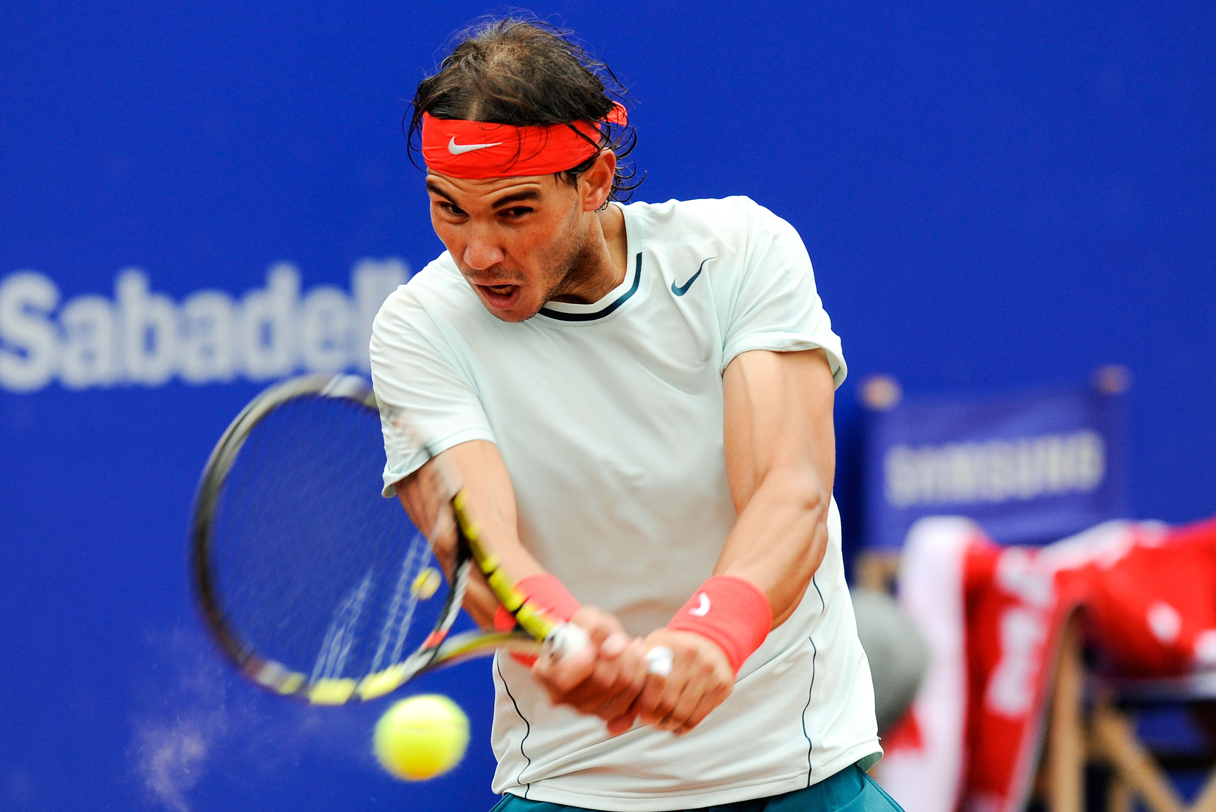 BARCELONA, SPAIN - APRIL 28: Rafael Nadal of Spain returns the ball againts Nicolas Almagro of Spain during his final match of day seven of the 2013 Barcelona Open Banc Sabadell on April 28, 2013 in Barcelona. Nadal won 6-3, 6-4. (Photo by David Ramos/Getty Images)