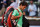 MADRID, SPAIN - MAY 09:  Roger Federer of Switzerland trudges off the pitch after his match against Kei Nishikori of Japan on day six of the Mutua Madrid Open tennis tournament at the Caja Magica on May 9, 2013 in Madrid, Spain.  (Photo by Gonzalo Arroyo Moreno/Getty Images)