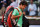 MADRID, SPAIN - MAY 09:  Roger Federer of Switzerland trudges off the pitch after his match against Kei Nishikori of Japan on day six of the Mutua Madrid Open tennis tournament at the Caja Magica on May 9, 2013 in Madrid, Spain.  (Photo by Gonzalo Arroyo Moreno/Getty Images)