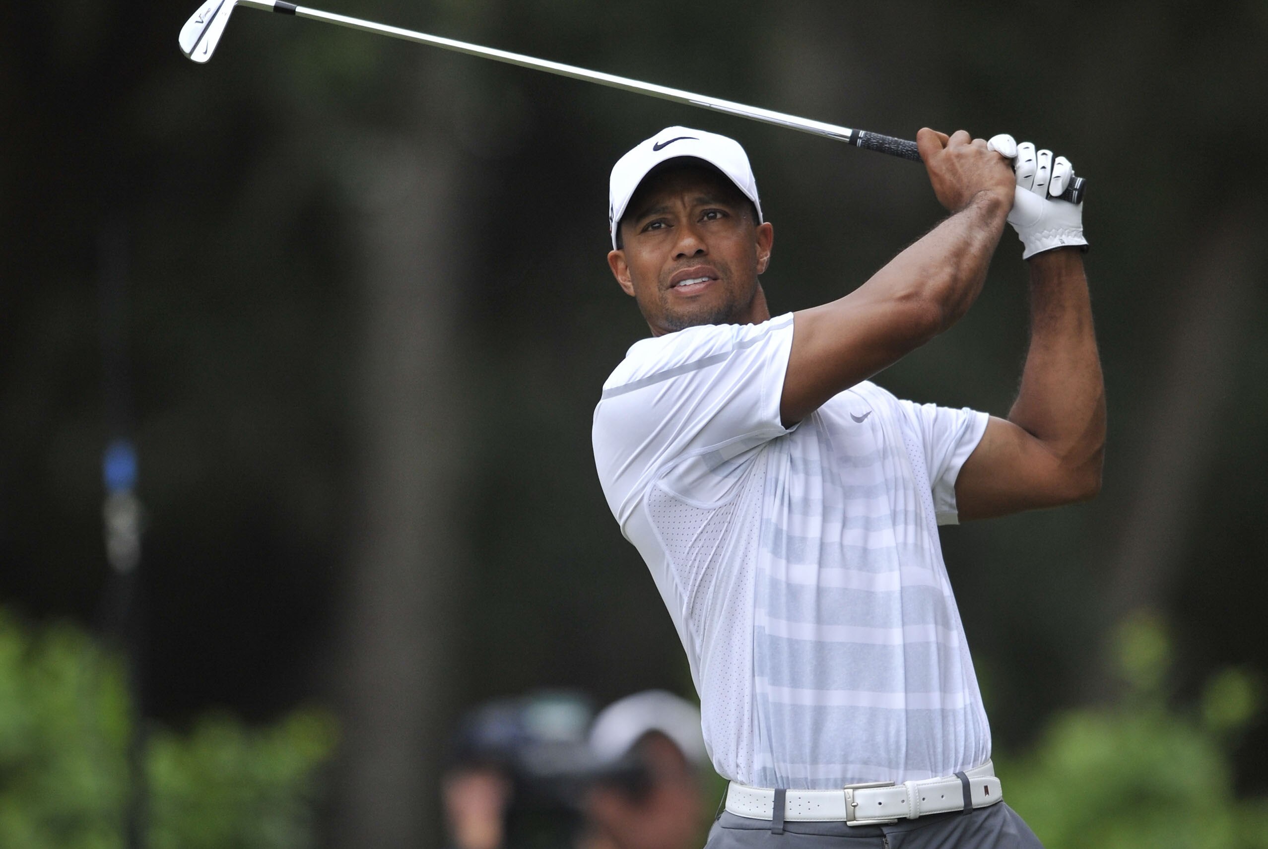 May 11, 2013; Ponte Vedra Beach, FL, USA; Tiger Woods hits his tee shot on the 12th hole in the third round at TPC Sawgrass - Stadium Course. Mandatory Credit: Brad Barr-USA TODAY Sports