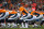 DENVER, CO - DECEMBER 2:  Quarterback Peyton Manning #18 of the Denver Broncos adjusts the play at the line of scrimmage during a game against the Tampa Bay Buccaneers at Sports Authority Field Field at Mile High on December 2, 2012 in Denver, Colorado. (Photo by Dustin Bradford/Getty Images)