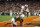 TEMPE, AZ - JANUARY 3:  Wide receiver Chris Gamble #7 of the Ohio State Buckeyes looks to the official for a flag as cornerback Glenn Sharpe #31 of the University of Miami Hurricanes is called for pass interference in the first over-time of the Tostitos Fiesta Bowl at Sun Devil Stadium on January 3, 2003 in Tempe, Arizona.  Ohio State won the game 31-24 in double-overtime, winning the NCAA National Championship.  (Photo by Jamie Squire/Getty Images)