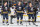 BUFFALO, NY - APRIL 22:  Mark Pysyk #53, Adam Pardy #27 and Steve Ott #9 of the Buffalo Sabres stand in respect of the playing of the Canadian and American national anthems before their game against the Winnipeg Jets at First Niagara Center on April 22, 2013 in Buffalo, New York.  (Photo by Sean Rudyk/Getty Images)