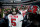 DENVER, CO - DECEMBER 2: Quarterback Josh Freeman #5 of the Tampa Bay Buccaneers huddles with his teammates before taking the field against the Denver Broncos at Sports Authority Field at Mile High on December 2, 2012 in Denver, Colorado. (Photo by Dustin Bradford/Getty Images)