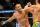 Feb 23, 2013; Anaheim, CA, USA; Lyoto Machida (blue shorts) and Dan Henderson (white shorts) during their UFC heavyweight bout at the Honda Center. Mandatory Credit: Jayne Kamin-Oncea-USA TODAY Sports