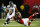 ATLANTA, GA - JANUARY 13:   Russell Wilson #3 of the Seattle Seahawks tries to avoid the tackle of  Kroy Biermann #71 of the Atlanta Falcons during the NFC Divisional Playoff Game at Georgia Dome on January 13, 2013 in Atlanta, Georgia.  (Photo by Kevin C. Cox/Getty Images)
