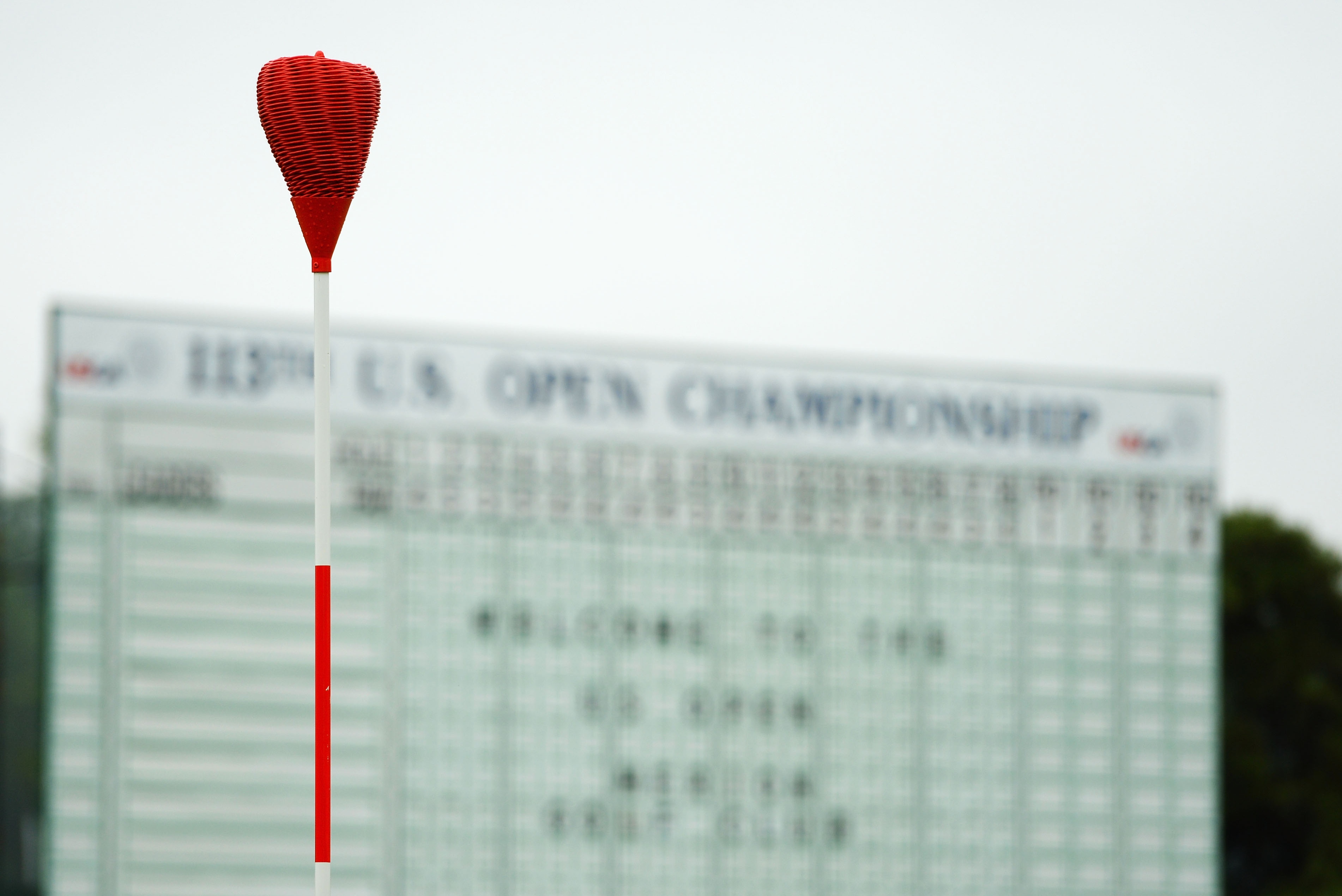 ARDMORE, PA - JUNE 10: A wicker basket marking a hole is seen in front of a leaderboard during a practice round prior to the start of the 113th U.S. Open at at Merion Golf Club on June 10, 2013 in Ardmore, Pennsylvania. (Photo by Ross Kinnaird/Getty Images)