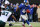 EAST RUTHERFORD, NJ - DECEMBER 30:   Ahmad Bradshaw #44 of the New York Giants carries the ball and avoids  Cullen Jenkins #97 of the Philadelphia Eagles at MetLife Stadium on December 30, 2012 in East Rutherford, New Jersey. The New York Giants defeated the Philadelphia Eagles 42-7.  (Photo by Elsa/Getty Images)