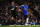 LONDON, ENGLAND - JANUARY 09:  Gael Kakuta of Chelsea holds off Mark Kennedy of Ipswich Town during the FA Cup sponsored by E.ON 3rd round match between Chelsea and Ipswich Town at Stamford Bridge on January 9, 2011 in London, England.  (Photo by Shaun Botterill/Getty Images)