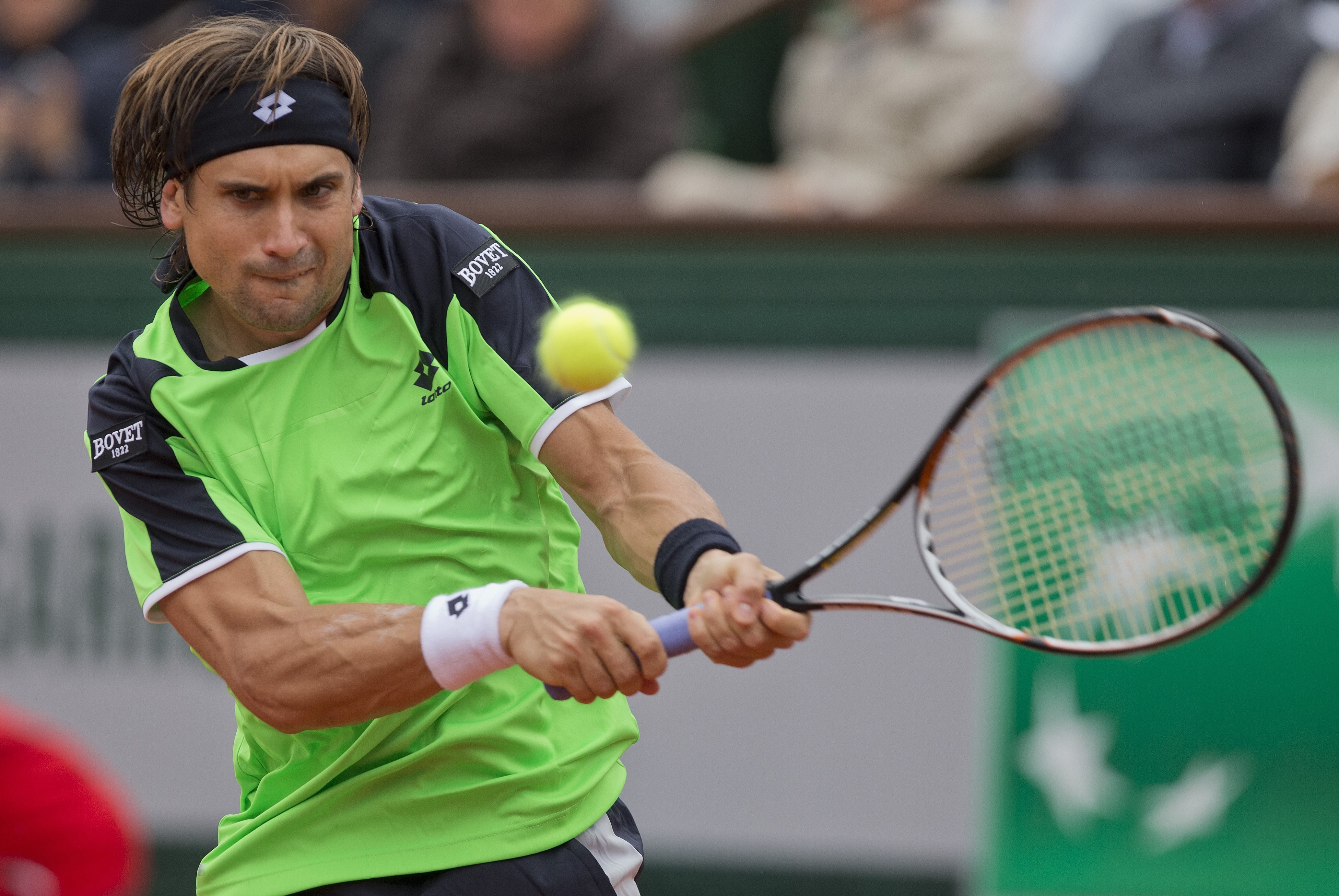 Jun 9, 2013; Paris, France; David Ferrer (ESP) during his match against Rafael Nadal (ESP) (not pictured) during the men's finals on day 15 at Roland Garros. Nadal won 6-3, 6-2, 6-3. Mandatory Credit: Susan Mullane-USA TODAY Sports