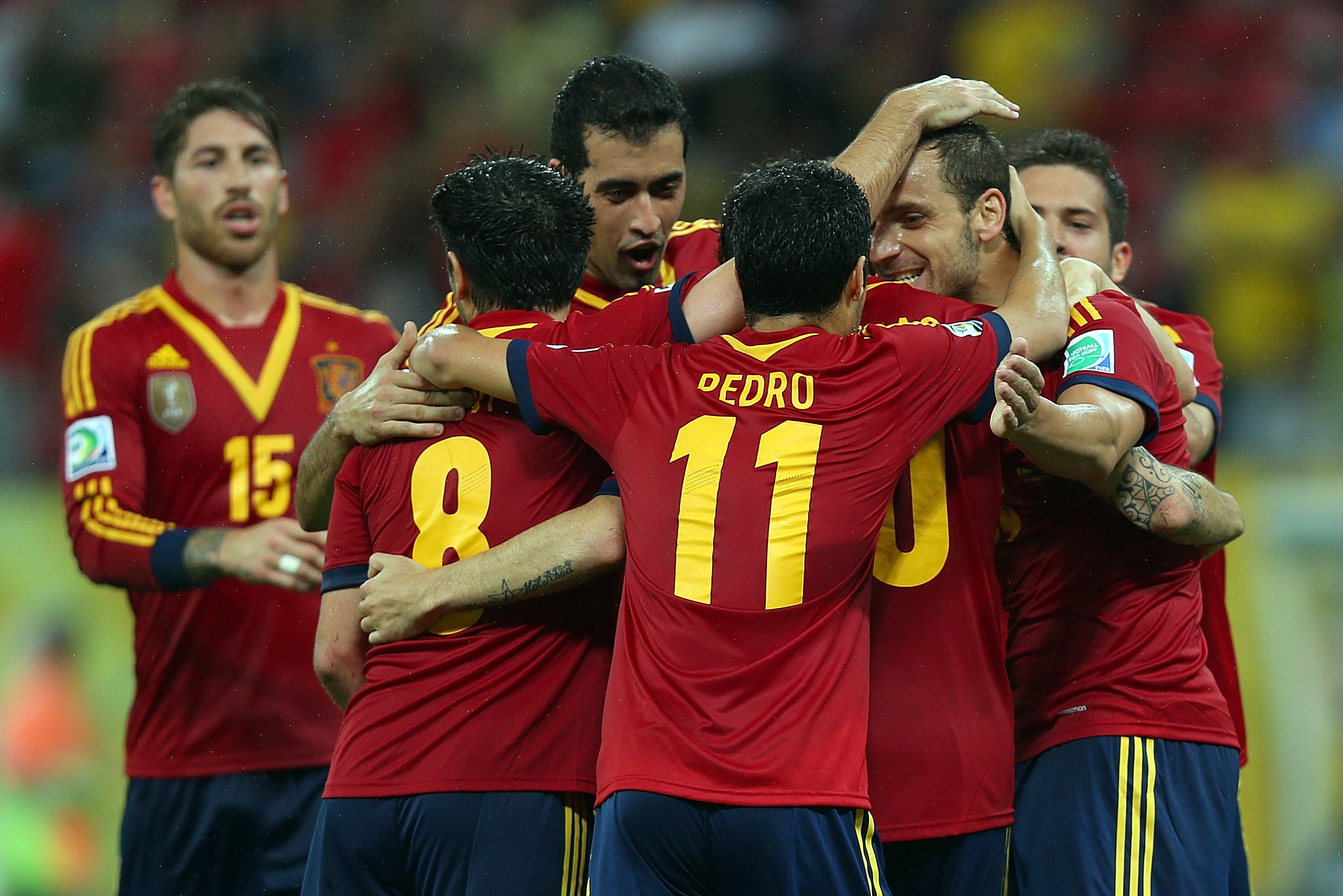 RECIFE, BRAZIL - JUNE 16: Roberto Soldado of Spain (R) celebrates with team mates as he scores their second goal during the FIFA Confederations Cup Brazil 2013 Group B match between Spain and Uruguay at the Arena Pernambuco on June 16, 2013 in Recife, Brazil. (Photo by Clive Rose/Getty Images)