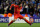 LIVERPOOL, ENGLAND - FEBRUARY 21:  Luis Suarez of Liverpool celebrates after scoring his team's third goal from a free kick during the UEFA Europa League round of 32 second leg match between Liverpool FC and FC Zenit St Petersburg at Anfield on February 21, 2013 in Liverpool, England.  (Photo by Alex Livesey/Getty Images)