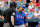 BALTIMORE, MD - JULY 10: Nelson Cruz #17 of the Texas Rangers questions home plate umpire Bill Welke after being called out looking for the third out of the first inning at Oriole Park at Camden Yards on July 10, 2013 in Baltimore, Maryland.  (Photo by Rob Carr/Getty Images)