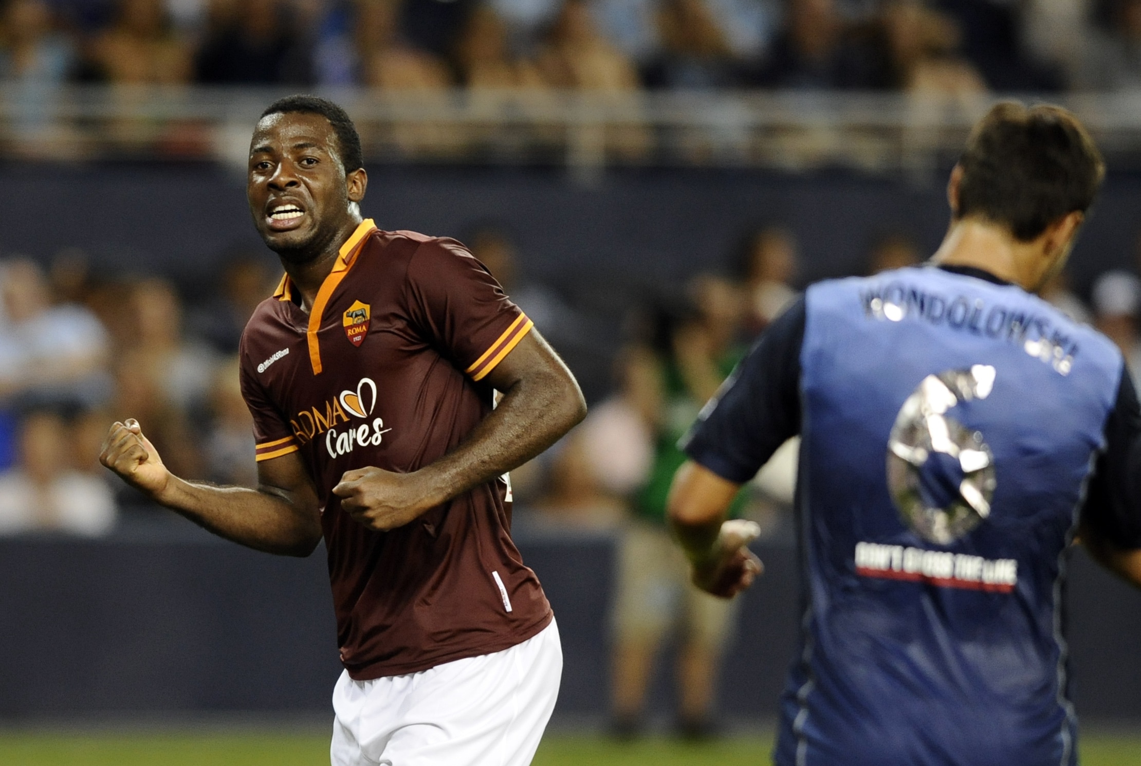Jul 31, 2013; Kansas City, KS, USA; AS Roma forward Junior Tallo (20) reacts after his goal against the MLS All Stars during the 2013 MLS All Star game at Sporting Park. Mandatory Credit: John Rieger-USA TODAY Sports