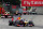 MONZA, ITALY - SEPTEMBER 08:  Sebastian Vettel of Germany and Infiniti Red Bull Racing leads the field early during the Italian Formula One Grand Prix at Autodromo di Monza on September 8, 2013 in Monza, Italy.  (Photo by Clive Mason/Getty Images)