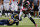 ST. LOUIS - NOVEMBER 21: Roddy White #84 of the Atlanta Falcons looks to slip past Darian Stewart #20 of the St. Louis Rams at the Edward Jones Dome on November 21, 2010 in St. Louis, Missouri.  The Falcons beat the Rams 34-17.  (Photo by Dilip Vishwanat/Getty Images)