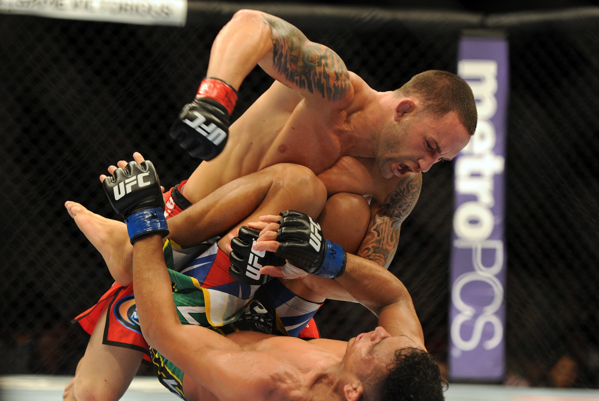 Jul 6, 2013; Las Vegas, NV, USA; Frankie Edgar and Charles Oliveira during their Featherweight Bout at the MGM Grand Garden Arena. Mandatory Credit: Jayne Kamin-Oncea-USA TODAY Sports