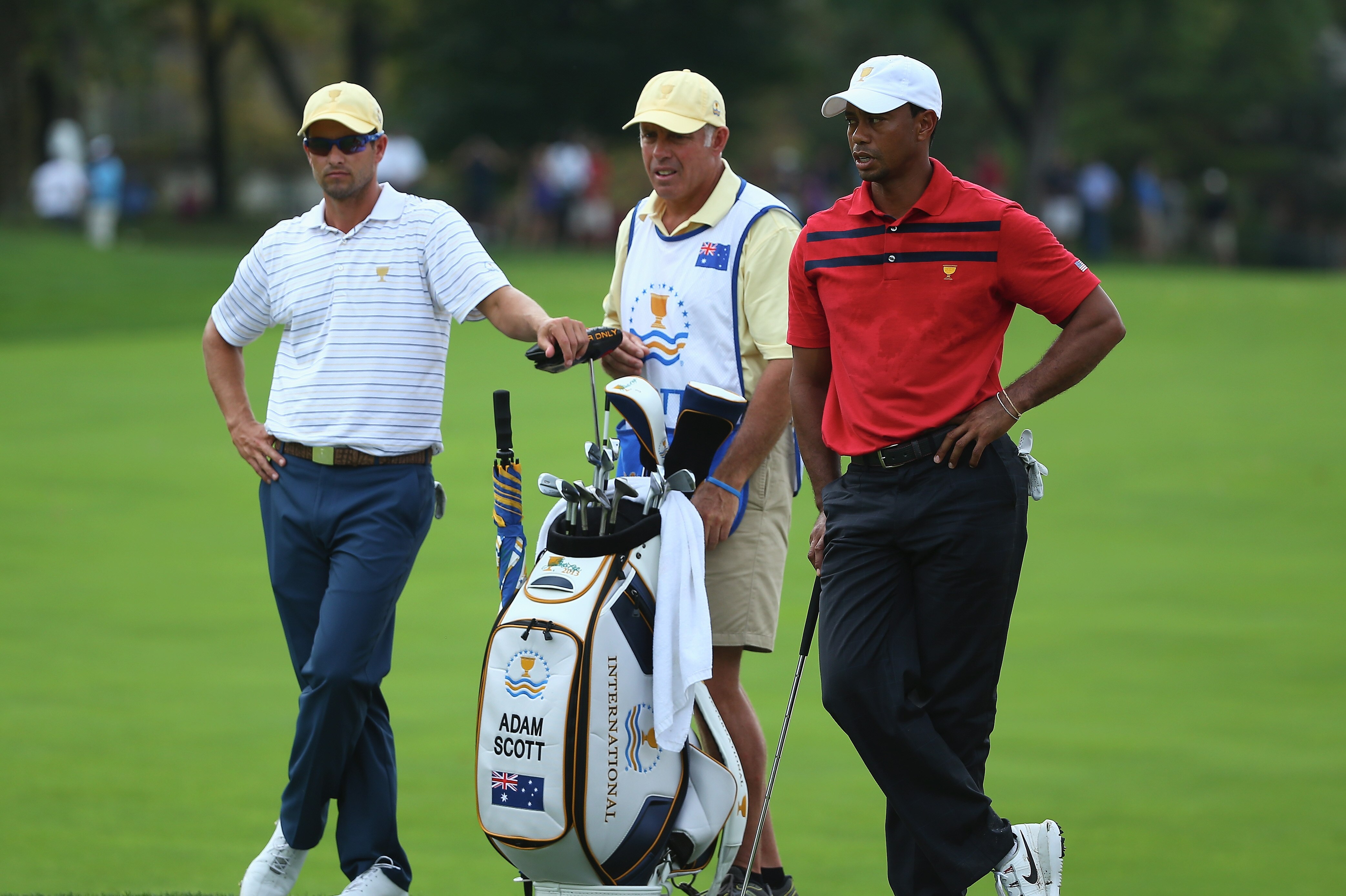 Adam Scott, Steve Williams and Tiger Woods
