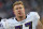FOXBORO, MA - JANUARY 10:  Matt Birk #77 of the Baltimore Ravens looks on as blood drips from the bridge of his nose against the New England Patriots during the 2010 AFC wild-card playoff game at Gillette Stadium on January 10, 2010 in Foxboro, Massachusetts. The Ravens won 33-13. (Photo by Jim Rogash/Getty Images)