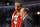 April 16, 2012; Chicago, IL, USA; Chicago Bulls head coach Tom Thibodeau talks with center Joakim Noah (13) during the second quarter at the United Center.  Mandatory Credit: Rob Grabowski-USA TODAY Sports