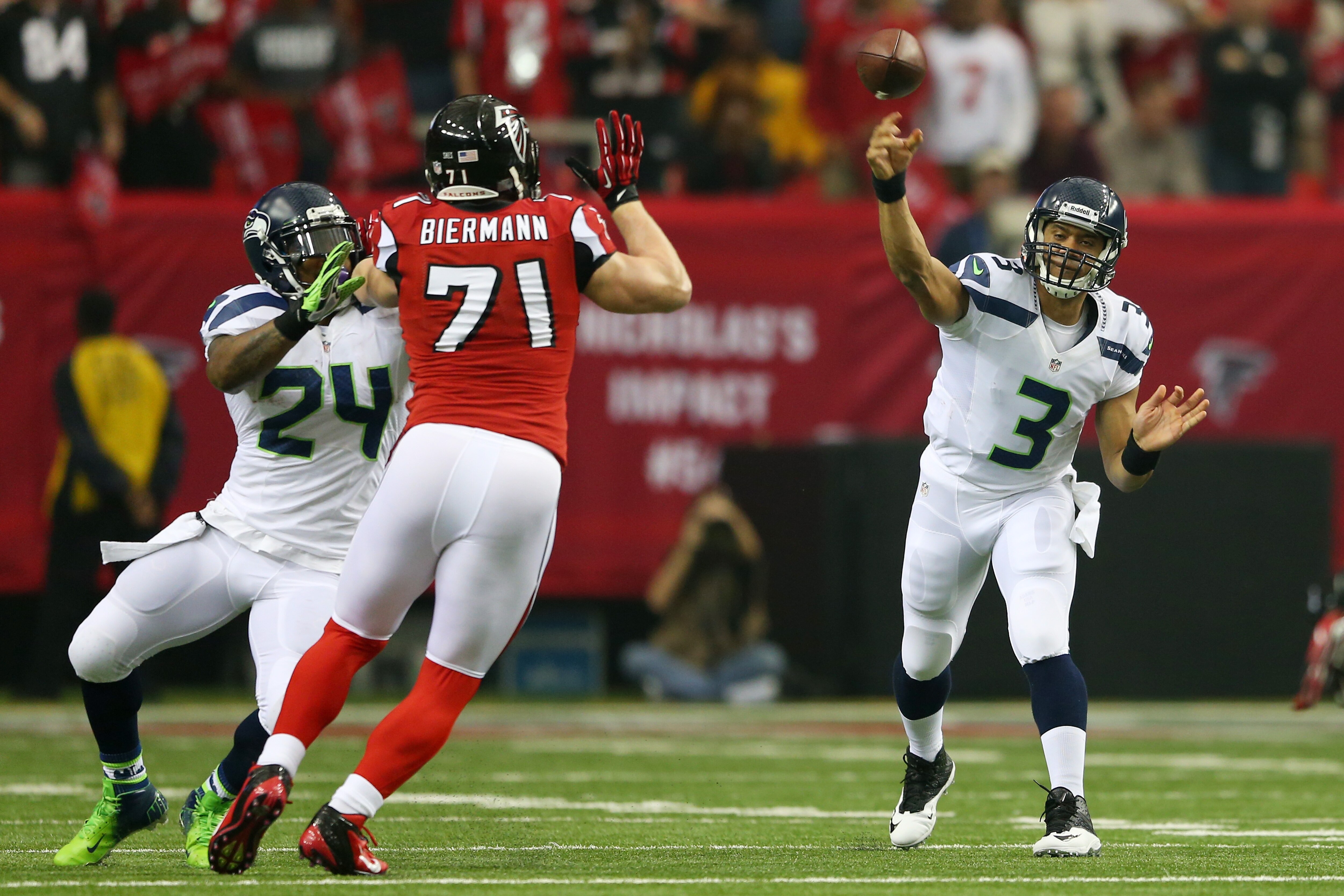 ATLANTA, GA - JANUARY 13: Russell Wilson #3 of the Seattle Seahawks throws the ball against the Atlanta Falcons during the NFC Divisional Playoff Game at Georgia Dome on January 13, 2013 in Atlanta, Georgia. (Photo by Mike Ehrmann/Getty Images)