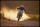 13 Nov 1992: A cyclist rides through a field of smoke at the Score Baja 1000.