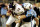 12 NOV 2001: Baltimore Raven quarterback Elvis Grbac, #16 is sacked by Tennessee Titan defender Frank Chamberlin, #57 during the first half at Adelphia Coliseum in Nashville, Tennessee. DIGITAL IMAGE. Mandatory Credit: Scott Halleran/ALLSPORT