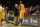 Apr 12, 2013; Los Angeles, CA, USA; Los Angeles Lakers shooting guard Kobe Bryant (24) talks to a medical staff member against the Golden State Warriors during the game at Staples Center. Mandatory Credit: Richard Mackson-USA TODAY Sports
