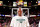 PORTLAND, OR - APRIL 10: Kobe Bryant #24 of the Los Angeles Lakers, wearing an NBA Green Week T-shirt, listens to the National Anthem before playing against the Portland Trail Blazers on April 10, 2013 at the Rose Garden Arena in Portland, Oregon. NOTE TO USER: User expressly acknowledges and agrees that, by downloading and or using this photograph, user is consenting to the terms and conditions of the Getty Images License Agreement. Mandatory Copyright Notice: Copyright 2013 NBAE (Photo by Cameron Browne/NBAE via Getty Images)