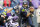 Nov 17, 2013; Seattle, WA, USA; Seattle Seahawks quarterback Russell Wilson (3) scrambles away from pressure by the Minnesota Vikings during the fourth quarter at CenturyLink Field. Mandatory Credit: Joe Nicholson-USA TODAY Sports