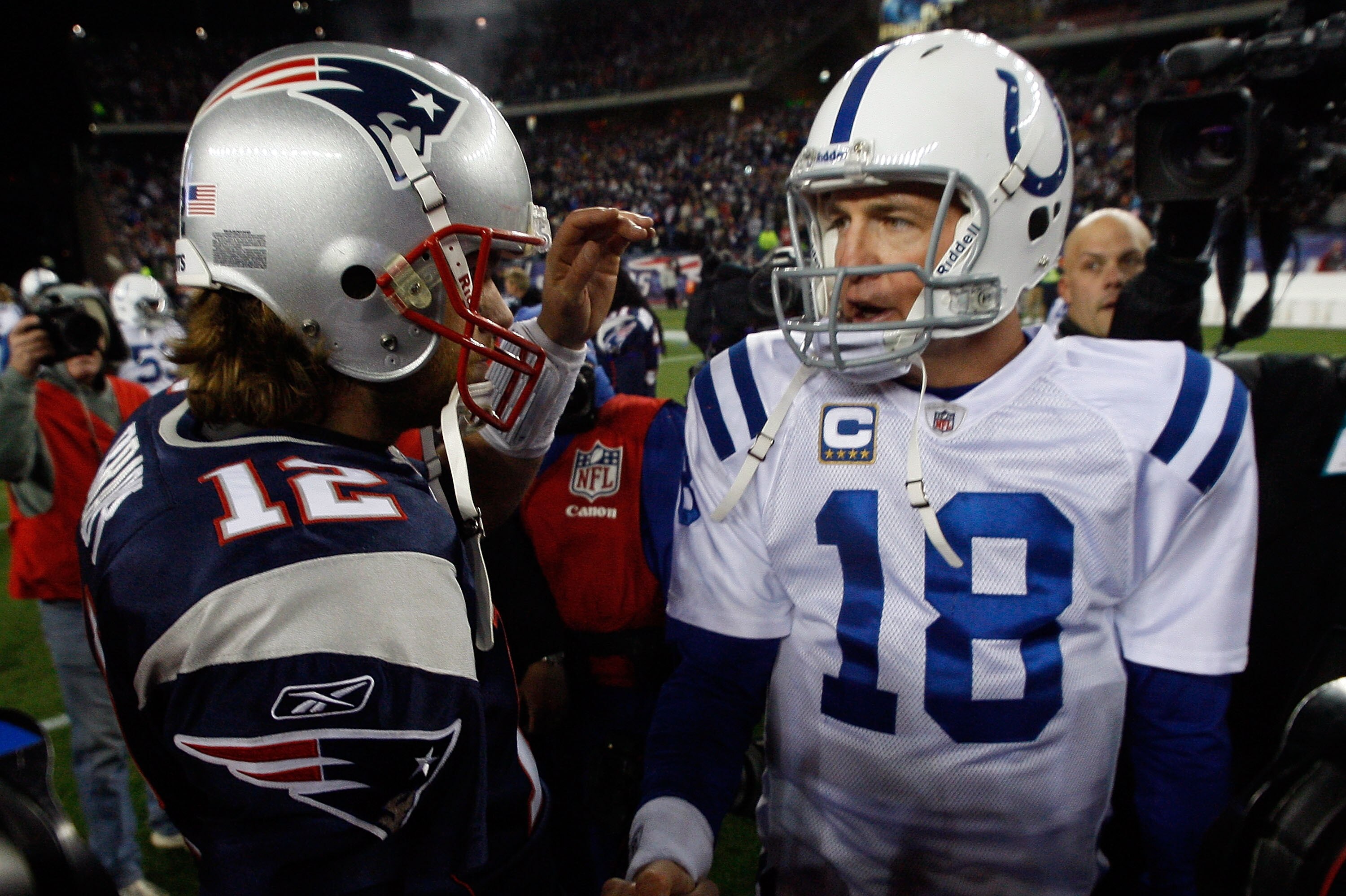 FOXBORO, MA - NOVEMBER 21: Tom Brady #12 of the New England Patriots shakes hands with Peyton Manning #18 of the Indianapolis Colts after their game at Gillette Stadium on November 21, 2010 in Foxboro, Massachusetts. (Photo by Jim Rogash/Getty Images)