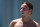 BARCELONA, SPAIN - JULY 28:  Tom Daley of Great Britain looks on during the Men's 10m Platform Diving final on day nine of the 15th FINA World Championships at Piscina Municipal de Montjuic on July 28, 2013 in Barcelona, Spain.  (Photo by Clive Rose/Getty Images)