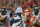 KANSAS CITY, MO - DECEMBER 01:  Quarterback Peyton Manning #18 of the Denver Broncos drops back to pass against the Kansas City Chiefs during the second half on December 1, 2013 at Arrowhead Stadium in Kansas City, Missouri.  Denver beat Kansas City 35-28.  (Photo by Peter Aiken/Getty Images)