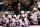 BOSTON, MA - JUNE 17:  A Boston Bruins fan holds a 'Boston Bruins Strong' sign behind head coach Joel Quenneville  of the Chicago Blackhawks and his team in Game Three of the 2013 NHL Stanley Cup Final at TD Garden on June 17, 2013 in Boston, Massachusetts.  (Photo by Elsa/Getty Images)