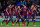 BARCELONA, SPAIN - DECEMBER 11:  FC Barcelona players celebrate after Gerard Pique of FC Barcelona scored the opening goal during the Champions League Group H match between FC Barcelona and Celtic FC at Camp Nou on December 11, 2013 in Barcelona, Spain.  (Photo by David Ramos/Getty Images)