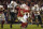 3 Jan 2002:  Quarterback Eric Crouch #7 of Nebraska drops back to pass against the defense of William Joseph #94 and Howard Clark #45 of Miami during the Rose Bowl National Championship game at the Rose Bowl in Pasadena, California.  Miami won the game 37-14, winning the BCS and the National Championship title. DIGITAL IMAGE. Mandatory Credit: Brian Bahr/Getty Images