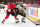 OTTAWA, ON - NOVEMBER 15: Chris Neil #25 of the Ottawa Senators battles for position as Brad Marchand #63 of the Boston Bruins stickhandles the puck along the boards at Canadian Tire Centre on November 15, 2013 in Ottawa, Ontario, Canada.  (Photo by Andre Ringuette/NHLI via Getty Images)